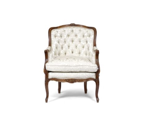 A LOUIS XVI STYLE OAK FRAMED BUTTON UPHOLSTERED CHAIR with squab cushion and carved cabriole legs 68cm wide x 93cm high 