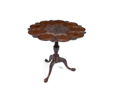 A GEORGE III MAHOGANY TILT TOP OCCASIONAL TABLE, the ring turned shaped top with carved acanthus leaf decoration, the fluted 