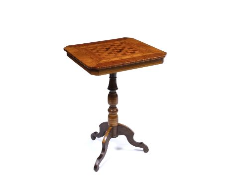 AN OLD SORRENTO WARE GAMES TABLE, the top decorated in a variety of woods with parquetry banding and central chess board with