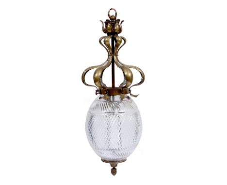 A BRASS ART NOUVEAU STYLE LIGHT FITTING with ovoid hobnail cut glass shade and pineapple finial beneath, 69cm high 