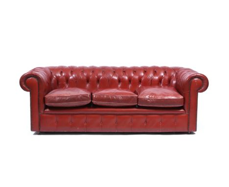 A RED LEATHER BUTTON UPHOLSTERED CHESTERFIELD SETTEE, 200cm wide 
