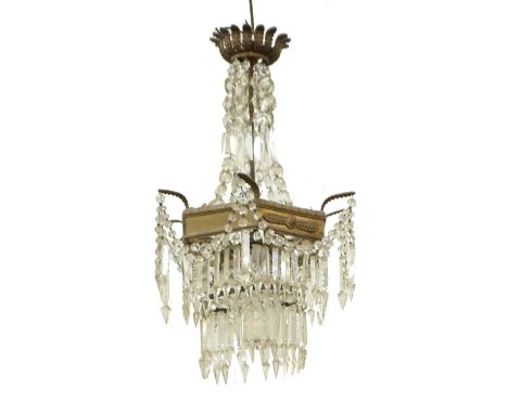 A BRASS AND CUT GLASS HANGING LIGHT FITTING with swags of drops, the central hexagonal frame with tear drops beneath, approxi