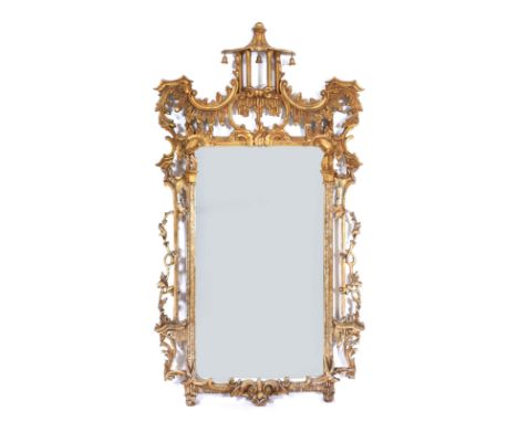 A CHINESE CHIPPENDALE STYLE GILTWOOD HANGING WALL MIRROR, with pagoda and waterfall frame and carved acanthus surround, 149cm