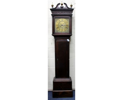 A GEORGE III OAK 30 HOUR LONGCASE CLOCK with ball and spike finials, blind fretwork decoration to the hood and mahogany cross