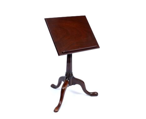 A GEORGE III AND LATER MAHOGANY MUSIC STAND with a turned column support, later adjustable top and tripod base, 50cm wide 