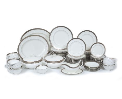 A COALPORT DINNER SERVICE with silver border with arch decoration, pattern number 10403, the service consisting of 15 dinner 