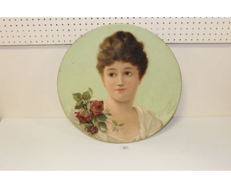 A HAND PAINTED PORTRAIT STUDY OF A LADY ON A TERRACOTTA CHARGER SIGNED M K BERRINGTON 1889 