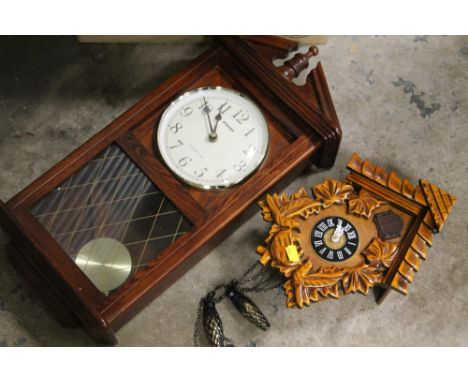 A BOX OF PRINTS, FRAMES AND CLOCKS TO INCLUDE A MODERN CUCKOO CLOCK, REPRODUCTION WALL CLOCK ETC. 