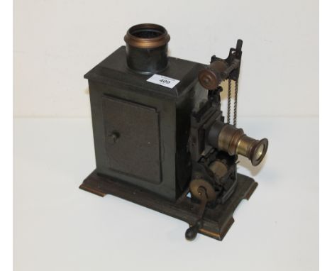 AN ANTIQUE MAGIC LANTERN STAMPED J F 