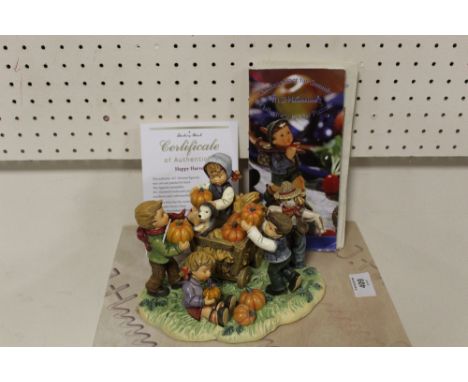A LARGE BOXED GOEBEL FIGURE GROUP ENTITLED HAPPY HARVEST WITH CERTIFICATE 