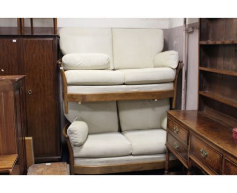 AN ERCOL COTTAGE STYLE THREE PIECE SUITE