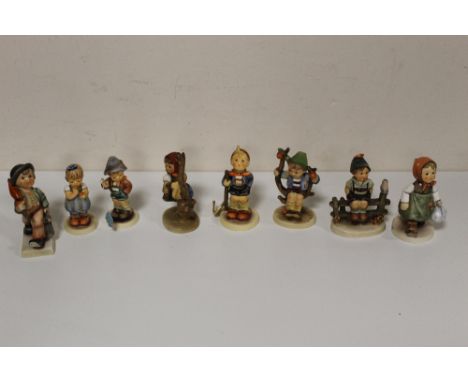 A COLLECTION OF EIGHT SMALL GOEBEL FIGURES 