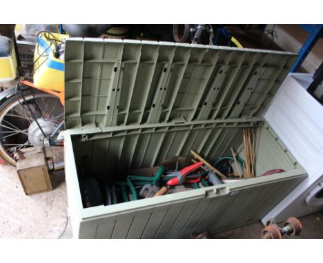 A PLASTIC OUTDOOR STORAGE UNIT PLUS GARDEN TOOLS ETC