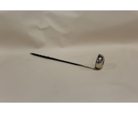 AN ANTIQUE WHALE BONE HANDLED TODDY LADLE WITH INSET COIN TO BOWL