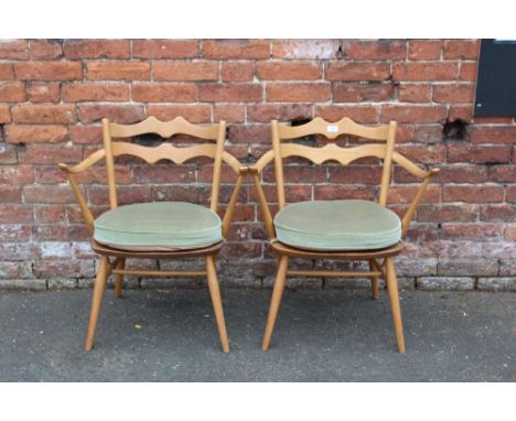 ERCOL - A PAIR OF VINTAGE ARMCHAIRS
