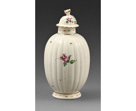 A Worcester fluted ovoid tea caddy and cover, c.1780, painted with sparse flowers, 15cm h  Chip to flower knob, hairline crac