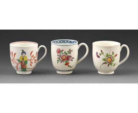 Three Worcester coffee cups, c.1770, painted with flowers and Chinese figures, 6.8cm h and smaller, one marked with crescent 