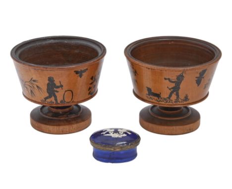 A pair of turned wooden cups painted with silhouettes of children and animals, early 20th c&nbsp;and South Staffordshire enam