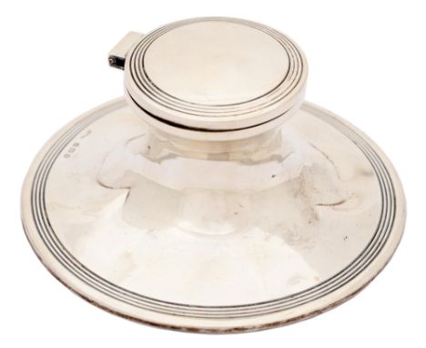 An Edwardian silver capstan inkwell, 12.5cm diam, marks rubbed, Birmingham 1907, loaded  Dented