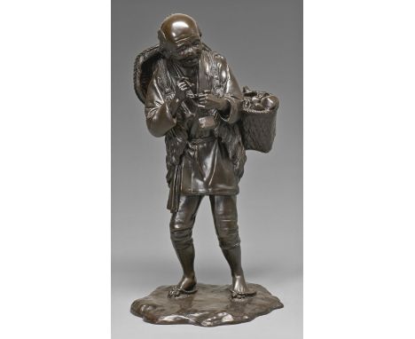 A Japanese bronze okimono of a farmer, Meiji period, pausing to light his pipe and carrying a basket of fungi over his should