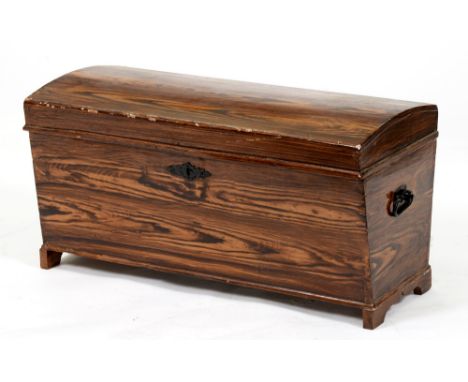 A stained wood trunk with domed lid and iron handles,&nbsp;43cm h; 81 x 37cm  Numerous chips to paint
