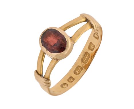 A 22ct gold wedding ring, adapted and set with a garnet, Birmingham 1878, 2g, size J  Worn