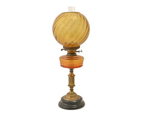 A Victorian brass oil lamp, on ebonised base, with amber glass font and globular shade, twin duplex burner, 60cm h  