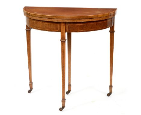 A Victorian mahogany and broken-line inlaid card table, on four square tapered legs with pottery castors, 75cm h; 38 x 75cm  