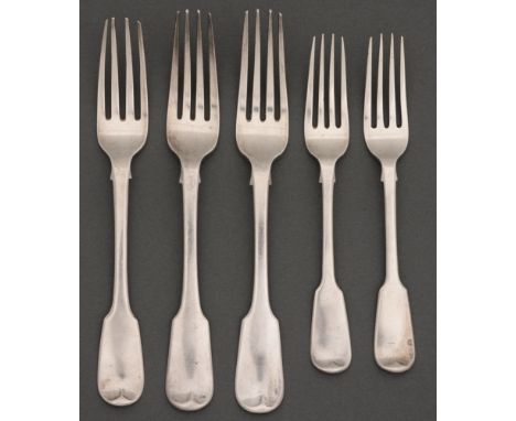 One and a pair of George IV silver table forks, Fiddle pattern, crested, both London, by Robert Rutland 1822 and Morris &amp;