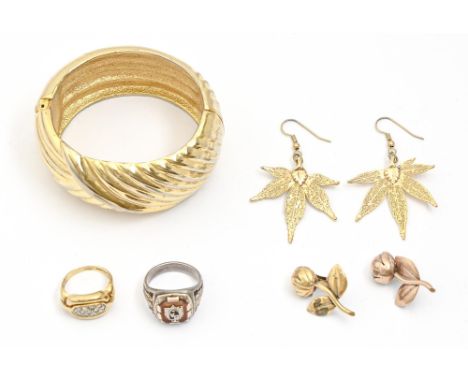 An Egyptian diamond ring, in 14ct gold, import marked, Sheffield 1996, 5.8g, size M, a gold plated bangle, two pairs of earri
