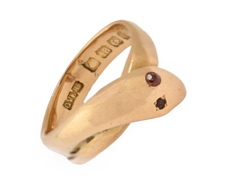 An Edwardian 18ct gold serpent ring, with garnet eyes, Birmingham 1905, 11.6g  Closed fracture on lower part of hoop, and scr