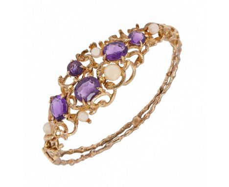 An amethyst and cultured pearl bangle, in 9ct gold, 60mm (internal), 21.6g  Good condition