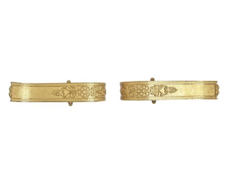 A pair of gilt lacquered brass curtain tie backs, in Empire style, and wall mounts (4)  