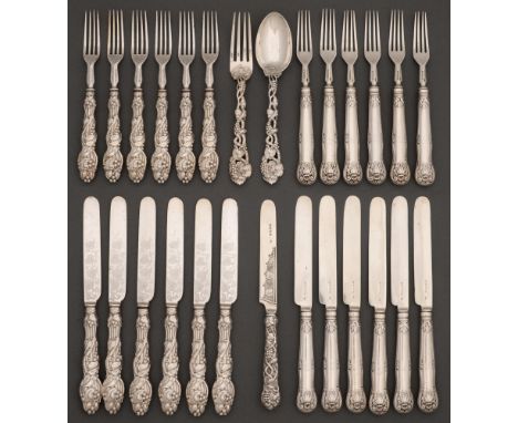 A set of six Victorian silver dessert knives and forks, King’s husk pattern, crested, by Chawner and Co, London 1867 and 1868
