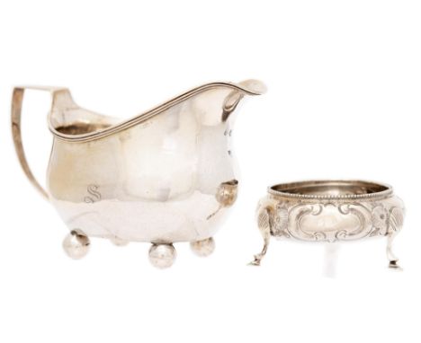 A George III silver cream jug, 13.5cm l, maker J H, part marked and a Victorian silver salt cellar, 5oz 5dwt (2)  Jug in good