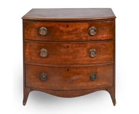 A George III bow fronted mahogany chest of drawers, with oak lined drawers, 85cm h; 56.5 x 92cm  Lacks the edge moulding from