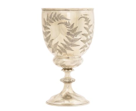 A Victorian silver cup, the ovoid bowl stamped with ferns, 29cm h, by Robert Hennell, London 1869, 26oz  Well preserved condi