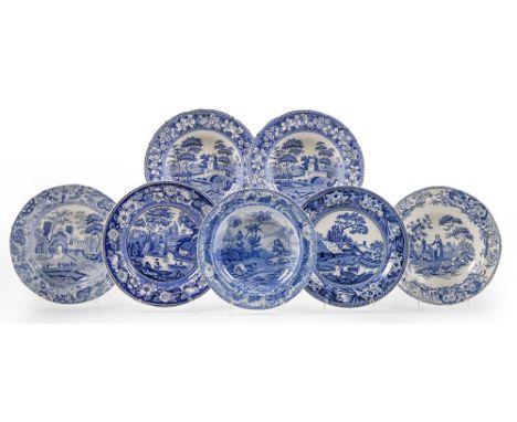 Seven blue printed soup and dinner plates, early 19th c and later, to include a Spode Indian Series Chase after a wolf soup p