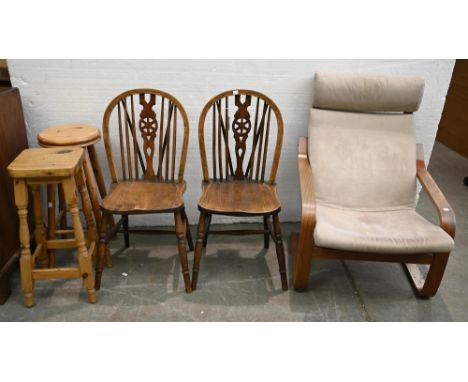 A cherrywood easy armchair, in the manner of Alvar Alto,&nbsp; of recent manufacture, with suede cushions, a pair of ash whee