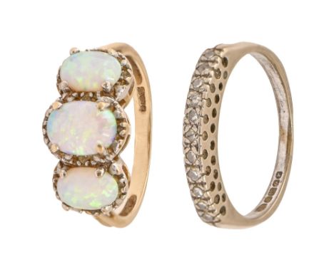 An opal ring&nbsp;in gold, marks obscured, 2.8g, size N and another ring, marks obscured, 3.5g (2)  Good condition