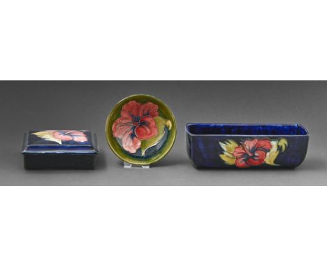 A Moorcroft Hibiscus flower trough, box and cover and bowl, c1970, flower trough 20cm l, impressed marks  Good condition