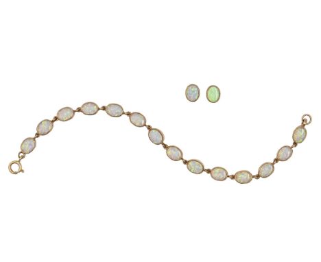 An opal bracelet and pair of ear studs, in gold, bracelet 18cm l, marked 375, 13g  Good condition