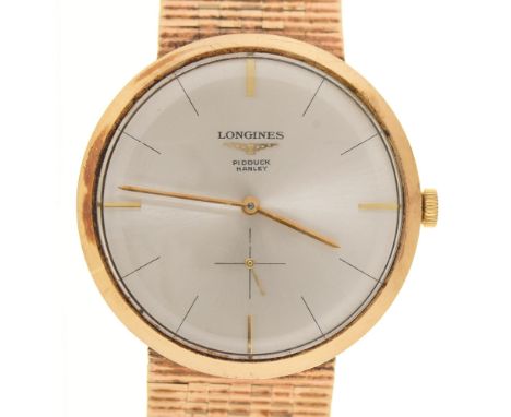 A Longines 9ct gold gentleman's wristwatch, Ref. 331, 32mm diam, on 9ct gold bracelet, 45.5g, maker's booklet and box  Watch 