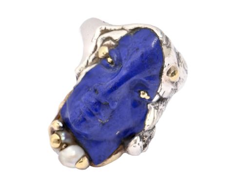 David Hensel (1945-) A carved lapis lazuli, baroque pearl, gold and silver face ring, signed H, 20g, size O  Provenance: N Bl