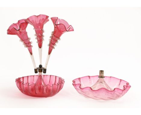 A Victorian cranberry glass flower stand, of three detachable vases with trailed decoration, 34cm h and a cranberry glass epe