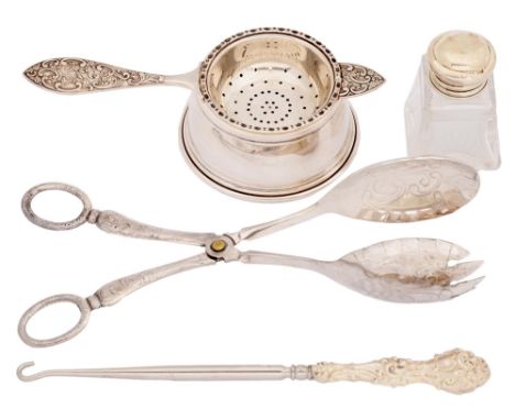 An Elizabeth II silver tea strainer and stand, by P H Vogel &amp; Co, Birmingham 1990, 4oz, a silver capped cut glass scent b