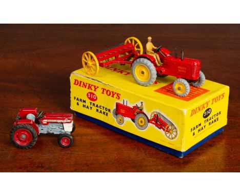 A Boxed set, number 310, together with a die-cast Massey Ferguson 165 tractor.In play-worn condition, the box slightly tatty 