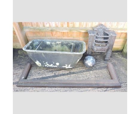 A galvanised trough, 92cm, together with a fender, a fire grate and a fishing float 