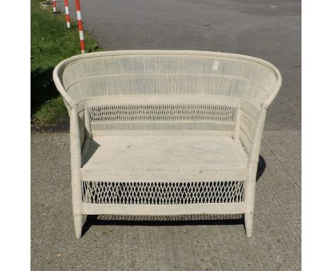 A painted wicker two seat sofa, 116cm