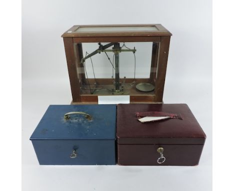 An early 20th century Trusty alarm box, together with a jewellery case and a set of scales
